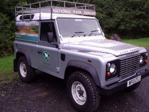 Silver Land Rover with picture of Ranger Area
